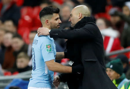 Soccer Football - Carabao Cup Final - Arsenal vs Manchester City - Wembley Stadium, London, Britain - February 25, 2018 Manchester City manager Pep Guardiola hugs Sergio Aguero as he is substituted Action Images via Reuters/Carl Recine