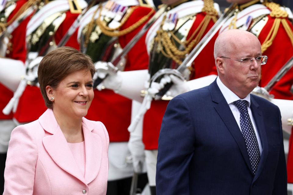 Scotland's First Minister Nicola Sturgeon and her husband and current chief executive officer of the Scottish National Party (SNP) Peter Murrel arrive to the National Service of Thanksgiving for The Queen's reign at Saint Paul's Cathedral in London on June 3, 2022 as part of Queen Elizabeth II's platinum jubilee celebrations. - Queen Elizabeth II kicked off the first of four days of celebrations marking her record-breaking 70 years on the throne, to cheering crowds of tens of thousands of people. But the 96-year-old sovereign's appearance at the Platinum Jubilee -- a milestone never previously reached by a British monarch -- took its toll, forcing her to pull out of a planned church service. (Photo by HENRY NICHOLLS / POOL / AFP) (Photo by HENRY NICHOLLS/POOL/AFP via Getty Images)