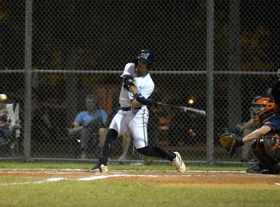 West Boca's Matt Pagan tries to help his own cause with a big swing at the plate during a regular season game against Benjamin on April 11, 2024.