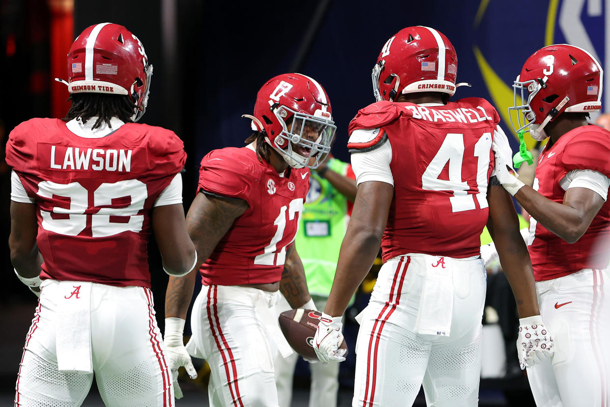ATLANTA, GEORGIA - DECEMBER 02: Trezmen Marshall #17 of the Alabama Crimson Tide celebrates with teammates after recovering a fumble during the third quarter against the Georgia Bulldogs in the SEC Championship at Mercedes-Benz Stadium on December 02, 2023 in Atlanta, Georgia. (Photo by Kevin C. Cox/Getty Images)