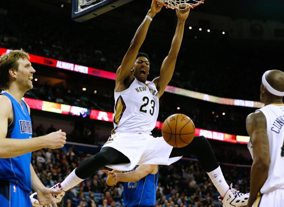 It's been too long since we've seen Anthony Davis throw down with fury in a game that mattered. (AP/Jonathan Bachman)