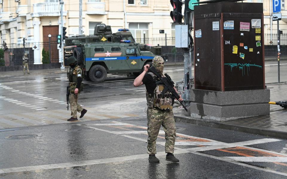 Fighters of Wagner private mercenary group are deployed in a street near the headquarters of the Southern Military District in the city of Rostov-on-Don