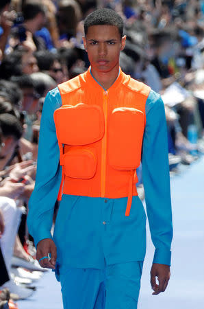 A model presents a creation by designer Virgil Abloh as part of his Spring/Summer 2019 collection for Louis Vuitton fashion house during Men's Fashion Week in Paris, France, June 21, 2018. REUTERS/Charles Platiau