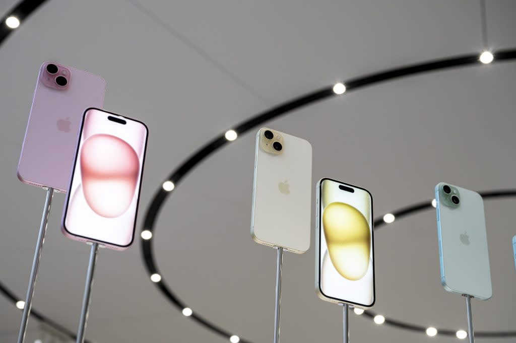 Apple iPhone 15 smartphones displayed during an event at Apple Park campus in Cupertino, California, US, on Tuesday, Sept. 12, 2023. Apple Inc. introduced its latest iPhones at an event Tuesday, banking on new materials, camera upgrades and improved performance to coax back consumers in a sluggish smartphone market. Photographer: David Paul Morris/Bloomberg via Getty Images