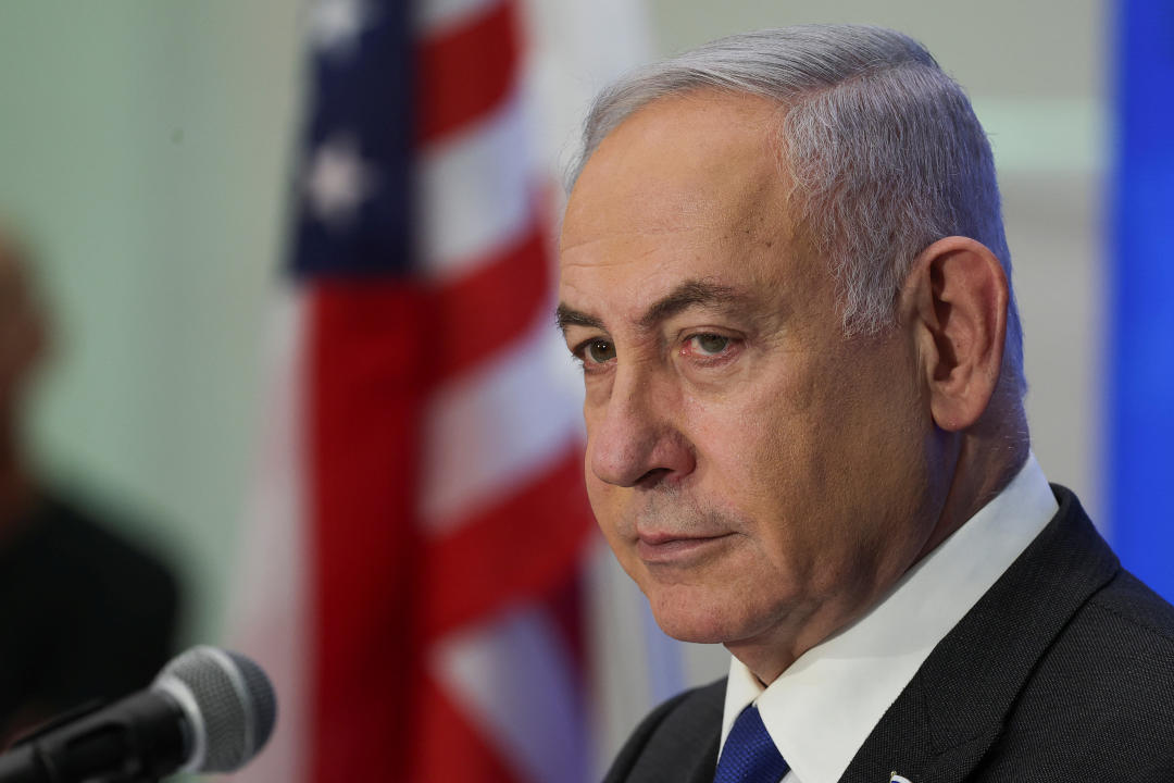 Israeli Prime Minister Benjamin Netanyahu addresses the Conference of Presidents of Major American Jewish Organizations, amid the ongoing conflict between Israel and the Palestinian Islamist group Hamas, in Jerusalem, February 18, 2024. REUTERS/Ronen Zvulun