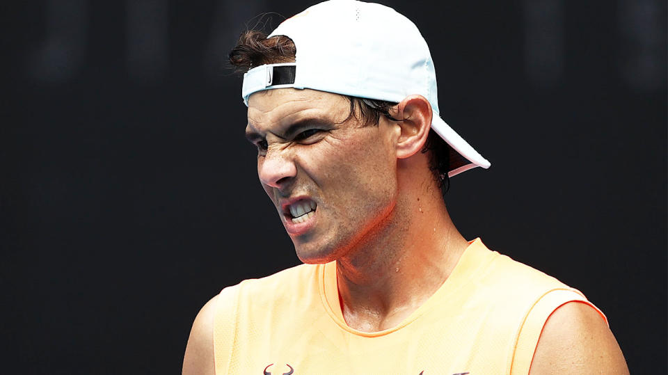 Rafa Nadal (pictured) looking frustrated during training at the Australian Open.