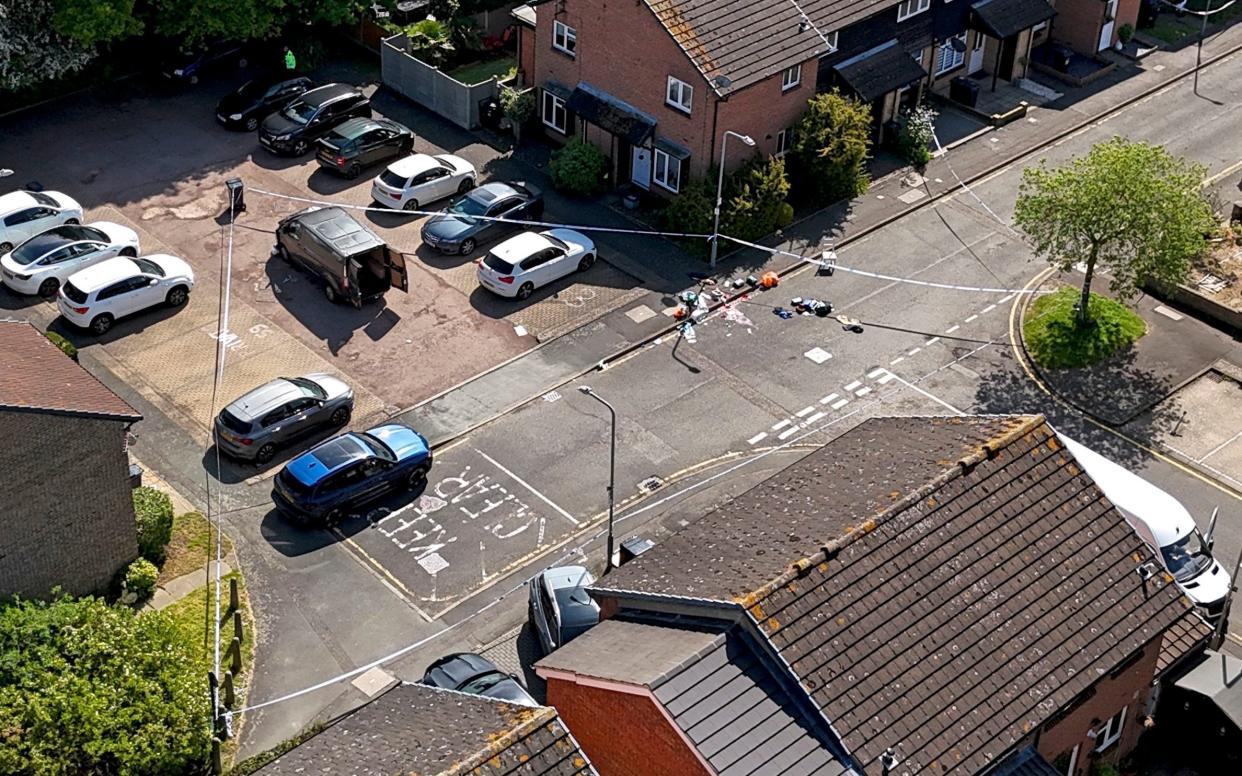 Police tape around a van on Laing Close in Hainault, east London