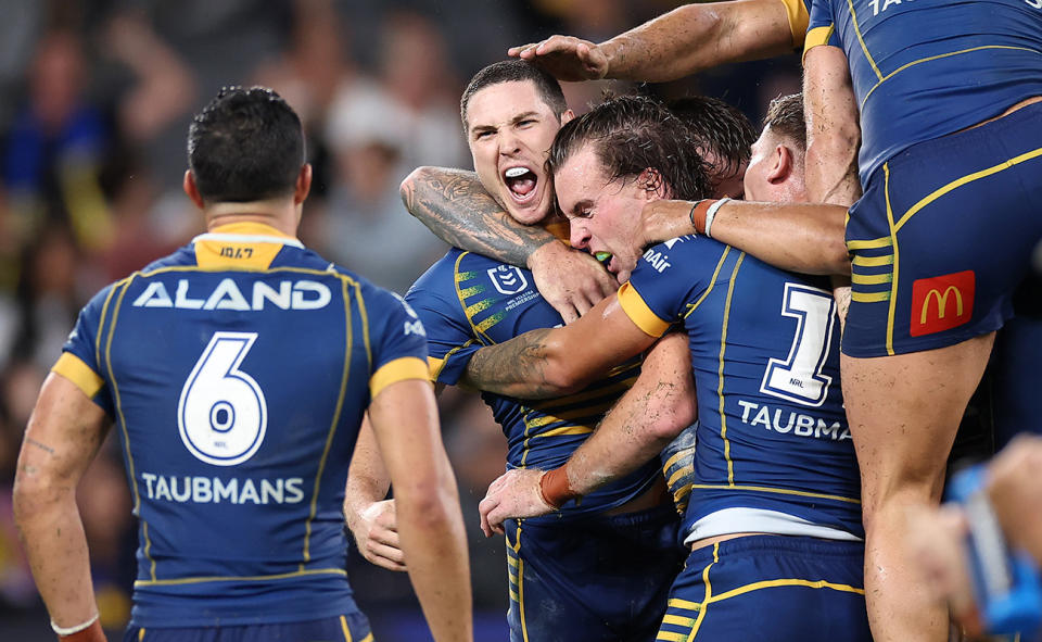 Mitchell Moses, pictured here celebrating with teammates after Parramatta's win over Penrith.