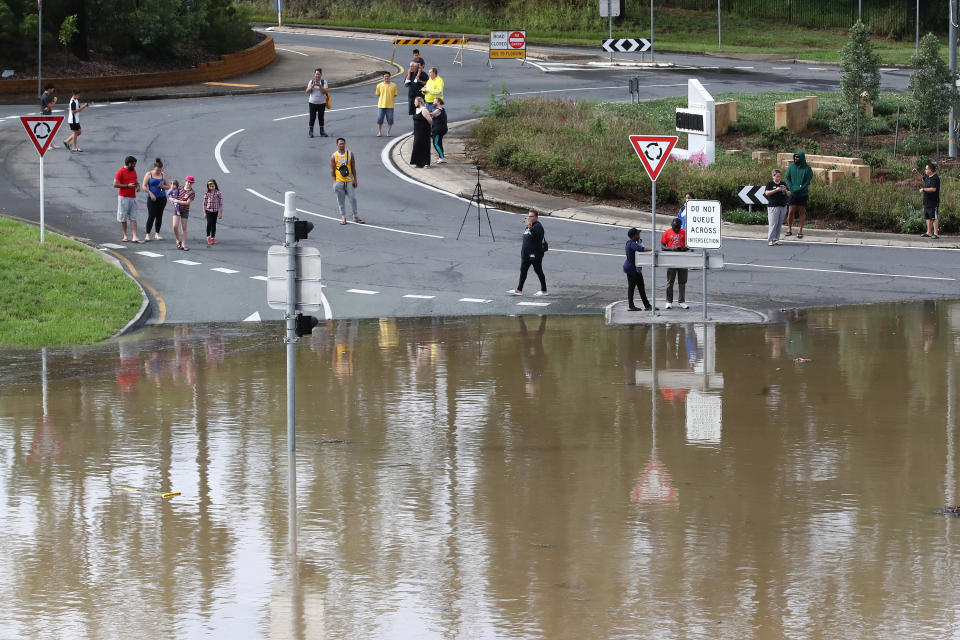 More than 370mm fell in a 48-hour period at the nearby weather station at Greenbank. Source: AAP