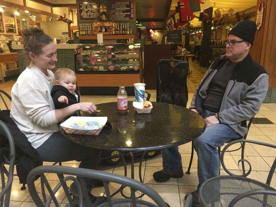 Stormy Patterson and her husband, Roger Kornfeind, get a bite to eat with their 16-month-old daughter Rowan at a mall in Whitehall, Pennsylvania, on February 9, 2017. Patterson has boycotted Hobby Lobby for years over the chain’s stance on birth control, a phenomenon that seems to be gaining steam in the Donald Trump era as activists who either oppose or support the president target stores and brands for boycotts. (AP Photo/Michael Rubinkam)