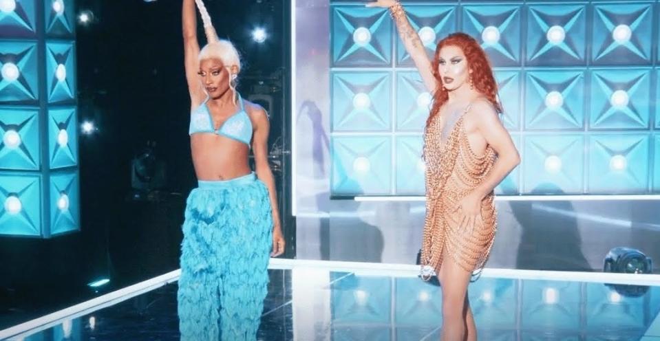 Jaida and Trinity raising their arms in the air