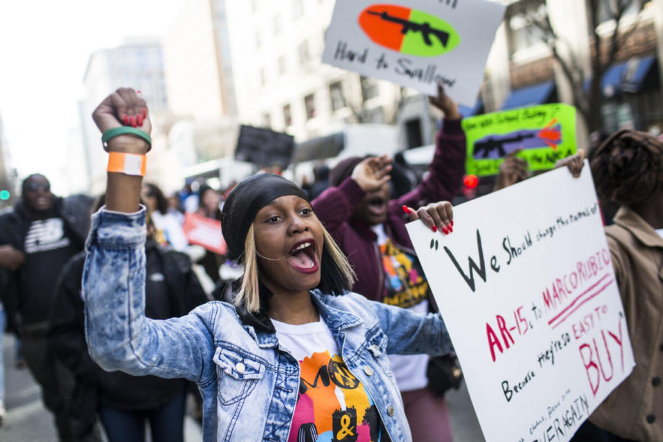 Demonstrators from Baltimore march in the March for Our Lives rally March 24, 2018 in Washington, DC. (Photo by Zach Gibson/Getty Images)