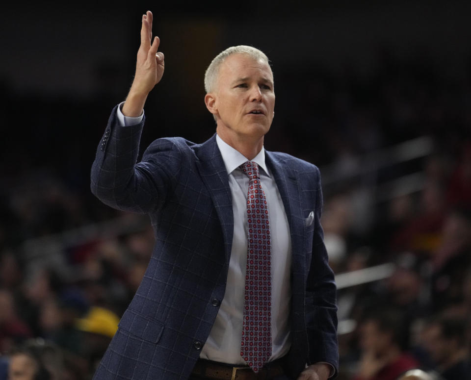 FILE - Southern California head coach Andy Enfield walks near the bench during the second half of an NCAA college basketball game against Washington, Feb. 4, 2023, in Los Angeles. After an eventful summer, men’s basketball coach Enfield was relieved that classes began last week. He said that Bronny James is doing well and attending classes after the highly-regarded freshman went into cardiac arrest during a workout last month. (AP Photo/Marcio Jose Sanchez, File)