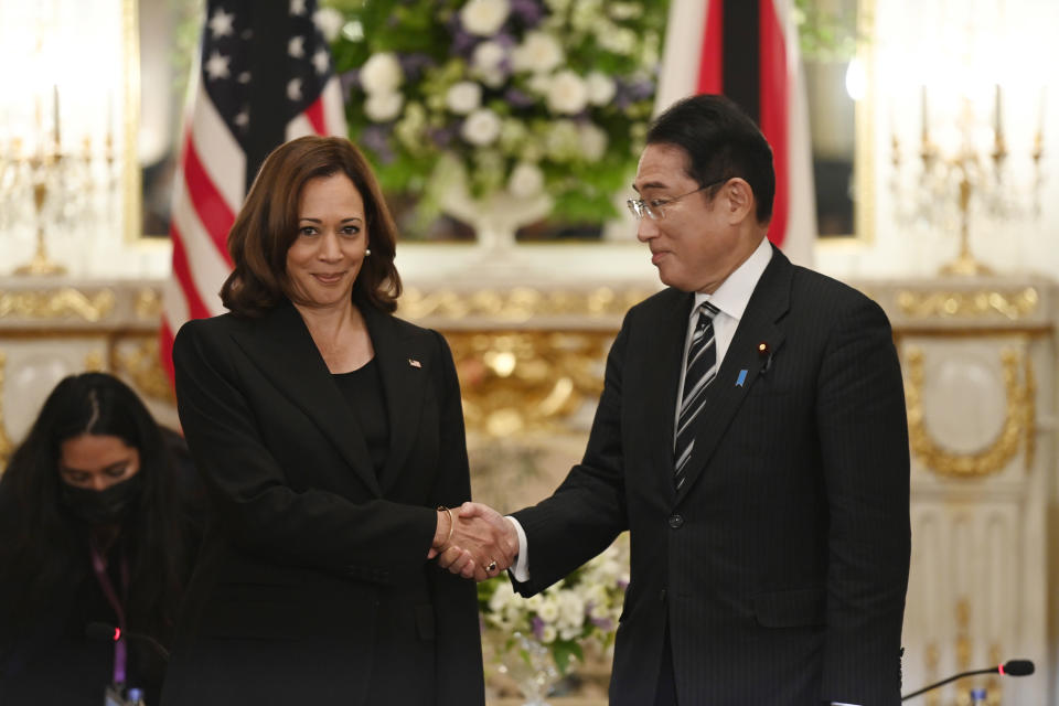 U.S. Vice President Kamala Harris, left, and Japan's Prime Minister Fumio Kishida shake hands before the Japan-USA bilateral meeting at the Akasaka Palace state guest house in Tokyo, Monday, Sept. 26, 2022. (David Mareuil/Pool Photo via AP)