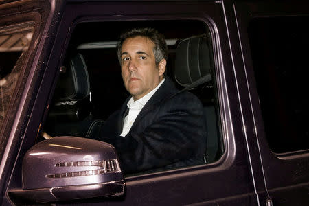 FILE PHOTO: U.S. President Donald Trump's personal lawyer Michael Cohen drives after leaving his hotel in New York City, U.S., April 11, 2018. REUTERS/Brendan McDermid/File Photo