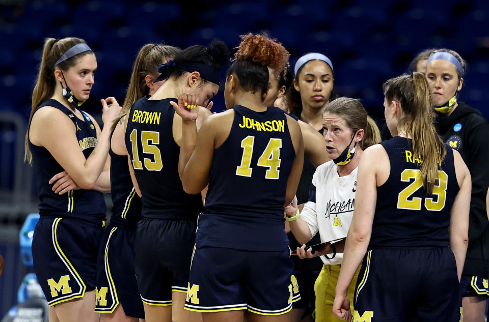 Michigan had a rough ride home after a disappointing NCAA exit. (Elsa/Getty Images)