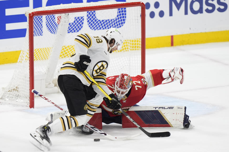 Boston Bruins center Pavel Zacha (18) attempts a shot at Florida Panthers goaltender Sergei Bobrovsky (72) during the second period of Game 1 of the second-round series of the Stanley Cup Playoffs, Monday, May 6, 2024, in Sunrise, Fla. (AP Photo/Wilfredo Lee)