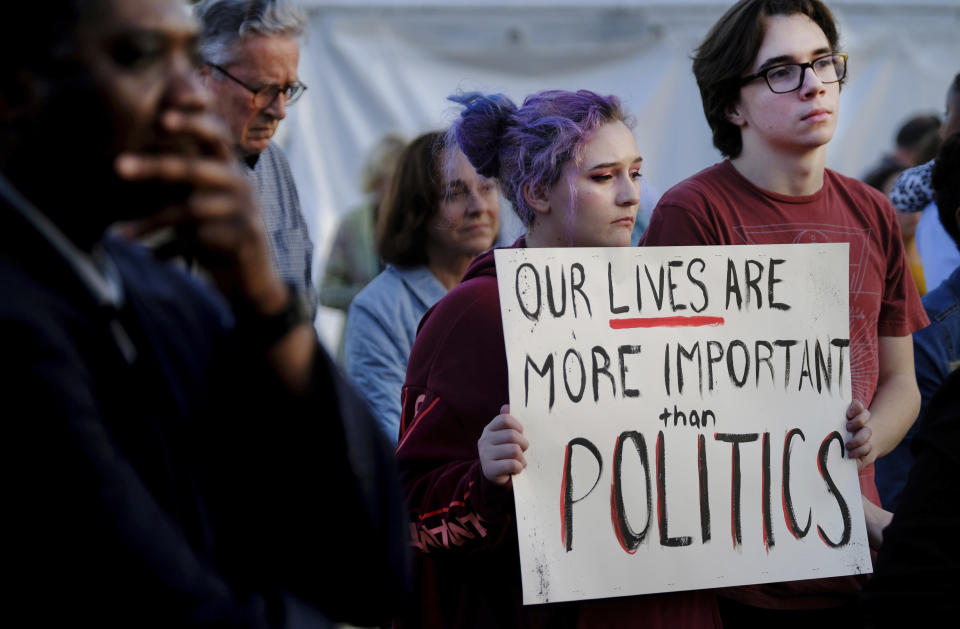 <p>A crowd of people hold a rally against gun violence, gathering at Marion Square in downtown Charleston, S.C., Monday, Feb. 19, 2018, following Wednesday’s deadly school shooting in Florida. (Photo: Matthew Fortner/The Post And Courier via AP) </p>