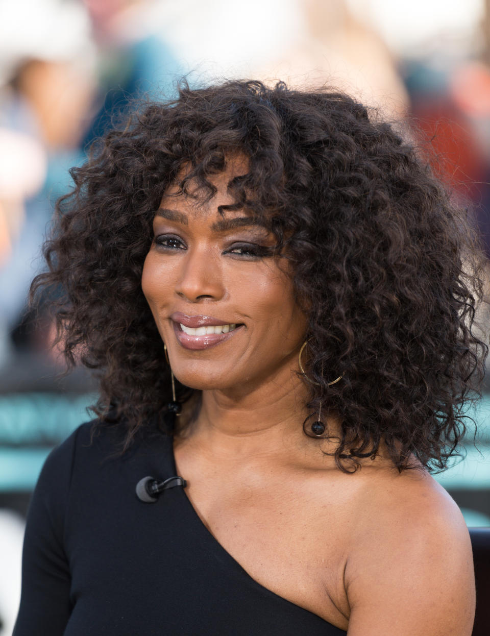 Angela Bassett with curly bangs