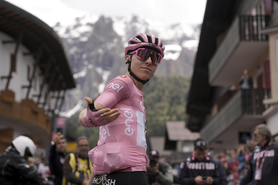 Slovenia's Tadej Pogacar turns around at the start of the 17th stage of the Giro d'Italia from Selva di Val Gardena to Passo Brocon, Italy, Wednesday, May 22, 2024. (Marco Alpozzi/LaPresse via AP)