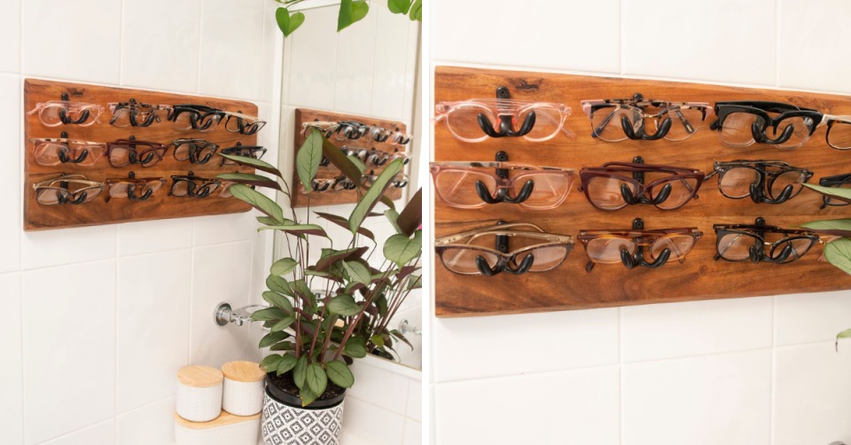 A Kmart wooden chopping after it&#39;s been transformed into a storage solution for glasses.