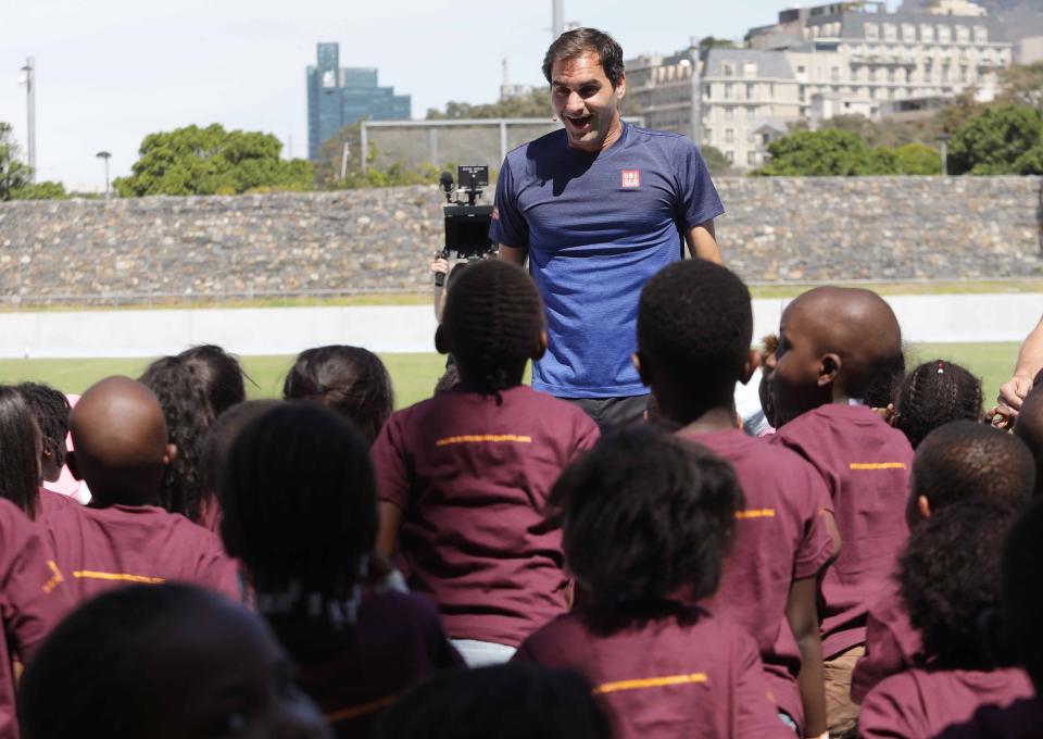 CAPE TOWN, SOUTH AFRICA - FEBRUARY 8 : Roger Federer of Switzerland and Rafael Nadal of Spain gather with children at Roger Federer Foundation ahead of attending a tennis match at Grand Parade as part of an exhibition game held to support the education of African children, on February 8, 2020 in Cape Town, South Africa. (Photo by Stringer/Anadolu Agency via Getty Images)