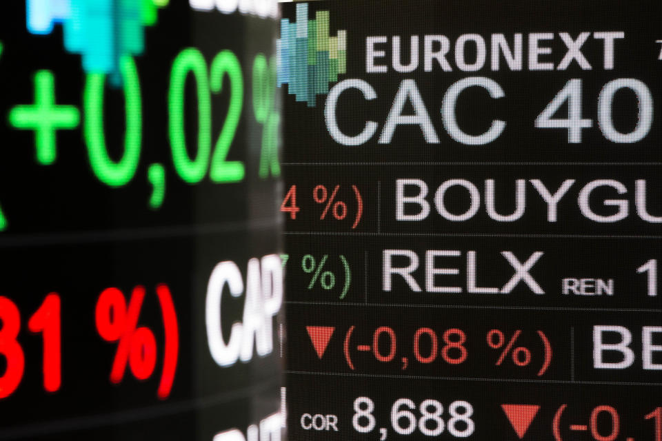 Boards show indexes at the Euronext headquarters in the business district la Defense, outside Paris, Tuesday, Jan. 10, 2017. Euronext is a cross-border European stock exchange, created in 2000 from the merger of the Amsterdam, Brussels and Paris stock exchanges and later with the NYSE Group, resulting in the formation of NYSE Euronext in 2007.  Euronext’s goal is to serve the real economy by bringing together buyers and sellers. (AP Photo/Kamil Zihnioglu)