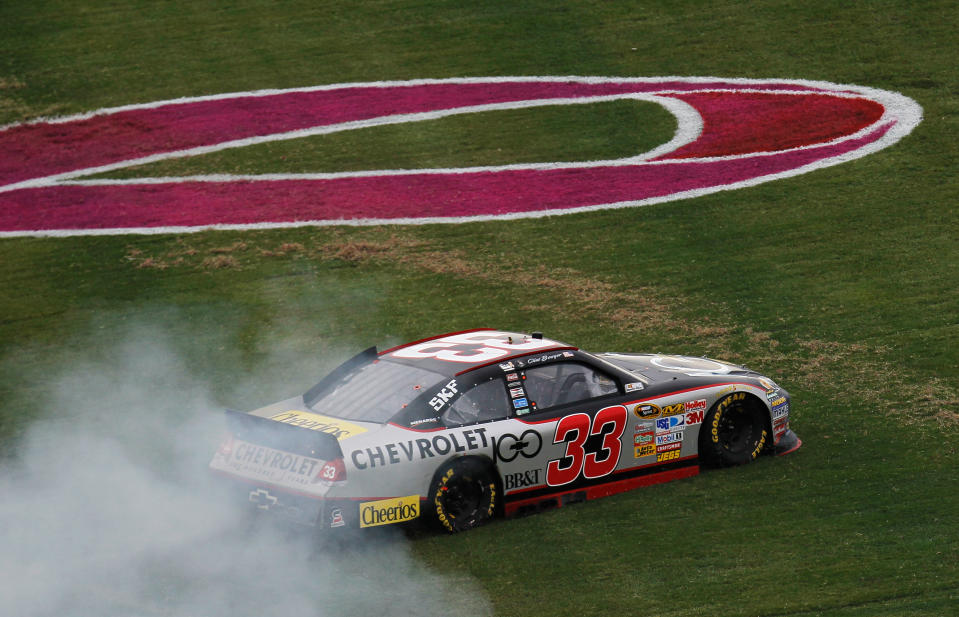 TALLADEGA, AL - OCTOBER 23: Clint Bowyer, driver of the #33 Chevy 100 Years Chevrolet, performs a burnout after winning the NASCAR Sprint Cup Series Good Sam Club 500 at Talladega Superspeedway on October 23, 2011 in Talladega, Alabama. (Photo by Kevin C. Cox/Getty Images for NASCAR)