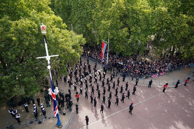 The coffin procession heads down the Mall towards Wellington Arch