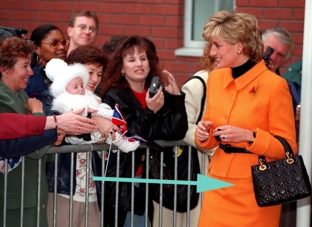 Princess Di holding the bag