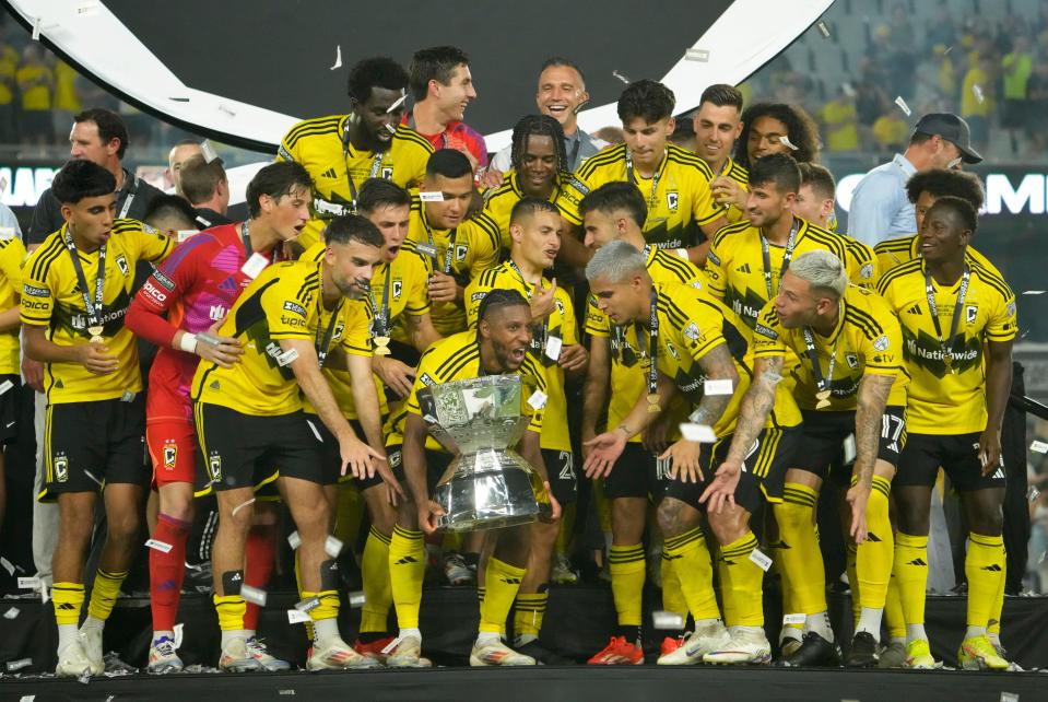 Aug 25, 2024; Columbus, Ohio, USA; 
Columbus Crew players hold the Leagues Cup trophy after a 3-1 win over Los Angeles FC in the Leagues Cup Final at Lower.com Field. 
Mandatory Credit: Barbara Perenic-USA TODAY Sports