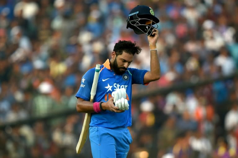 India's Yuvraj Singh returns to the pavilion after scoring 150 runs against England in the second one-day international in Cuttack on January 19, 2017