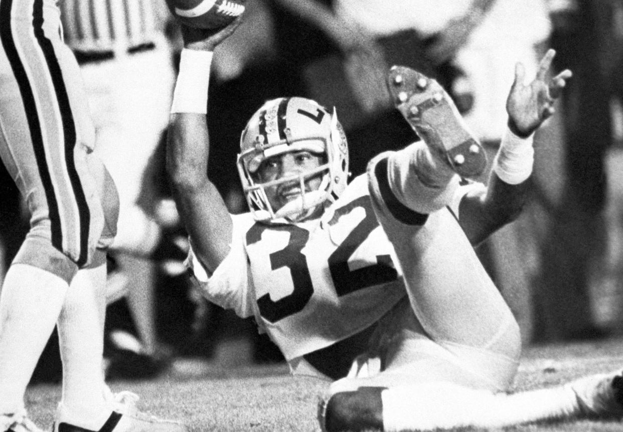 An LSU track star and football standout who was drafted by the Denver Broncos, Orlando McDaniel is dead at 59. (Associated Press)