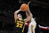 Iowa guard Caitlin Clark (22) shoots over South Carolina guard Bree Hall during the second half of the Final Four college basketball championship game in the women's NCAA Tournament, Sunday, April 7, 2024, in Cleveland. (AP Photo/Morry Gash)
