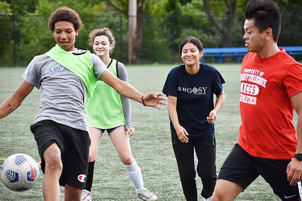 Argosy Charter School students practice soccer with coach Henry Zhang at Britland Park in Fall River on Wednesday, Sept. 7, 2022.