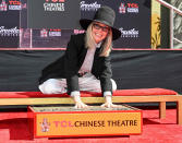 <p>Diane Keaton cements her place in history on Aug. 11 during her hand and footprint ceremony at the TCL Chinese Theatre in Hollywood.</p>