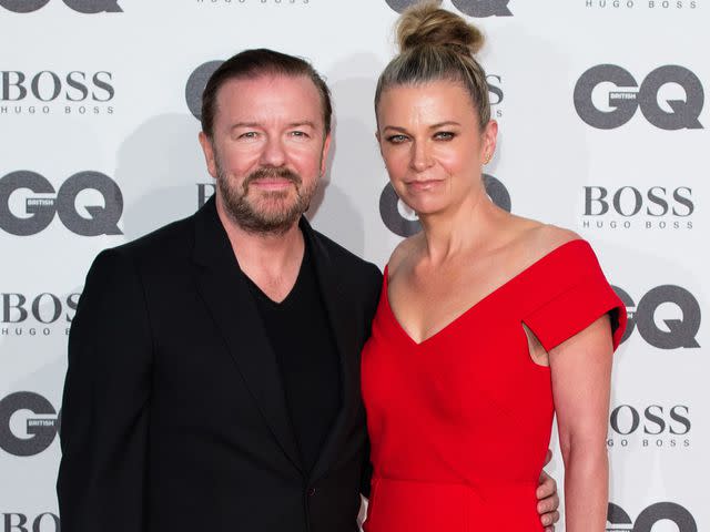 <p>Jeff Spicer/Getty</p> Ricky Gervais and Jane Fallon at the GQ Men Of The Year Awards in 2016