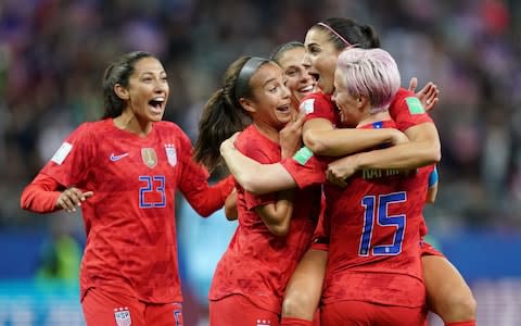 USA's players celebrate a goal during the France 2019 Women's World Cup Group F football match between USA and Thailand, on June 11, 2019, at the Auguste-Delaune Stadium in Reims, eastern France. - Credit: Getty Images