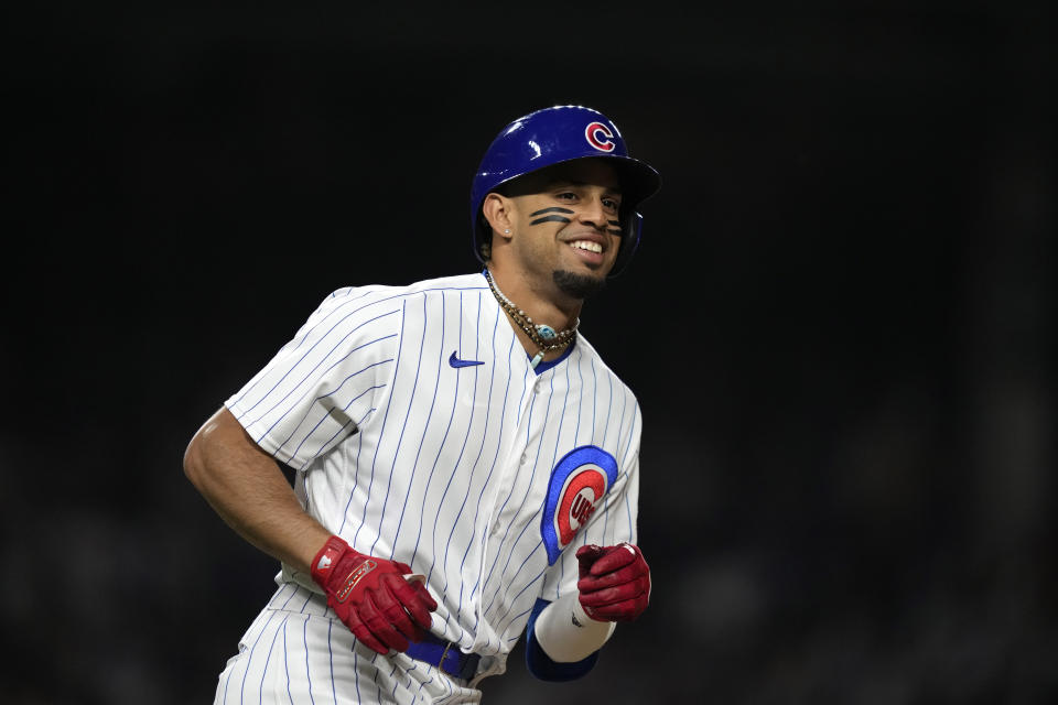 Chicago Cubs' Christopher Morel smiles as he runs the after hitting a home run off New York Mets relief pitcher Stephen Nogosek during the seventh inning of a baseball game Tuesday, May 23, 2023, in Chicago. (AP Photo/Charles Rex Arbogast)