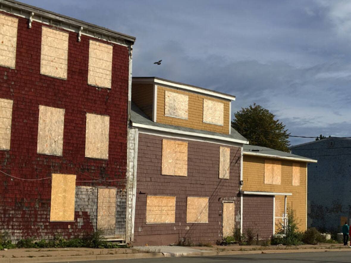Vacant buildings in Saint John's north end in 2016. The city reached a peak of about 220 vacant building cases in its files in 2018. (Julia Wright/CBC - image credit)