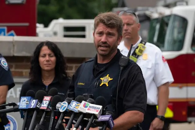 Lake County Sgt. Christopher Covelli speaks at the scene of the Fourth of July parade shooting in Highland Park, Illinois, where a gunman killed at least six people and injured dozens more. (Photo: YOUNGRAE KIM via Getty Images)