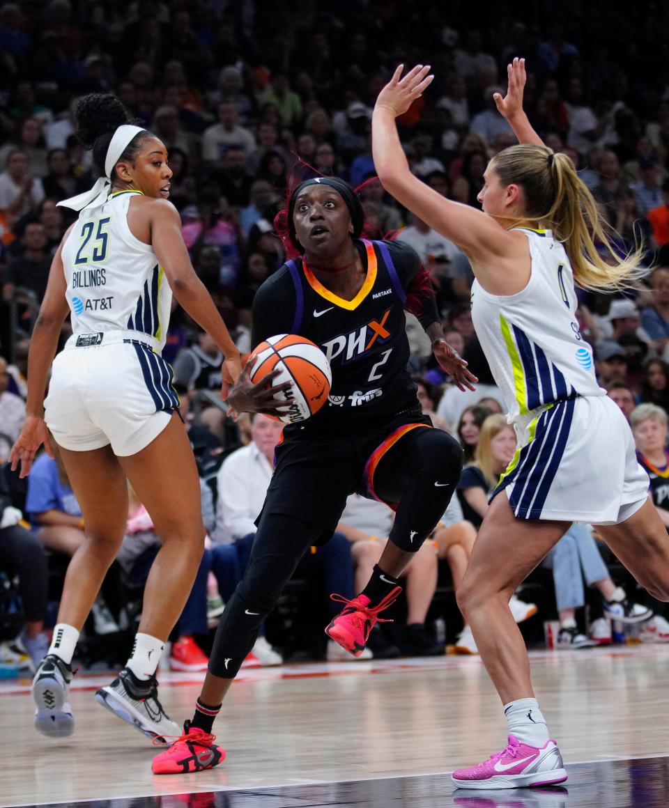 Mercury guard Kahleah Copper (2) drives against the Wings during a game at the Footprint Center in Phoenix on Saturday, May 25, 2024.