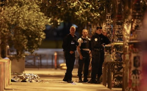 French police at the scene of the attack - Credit: ZAKARIA ABDELKAFI /AFP