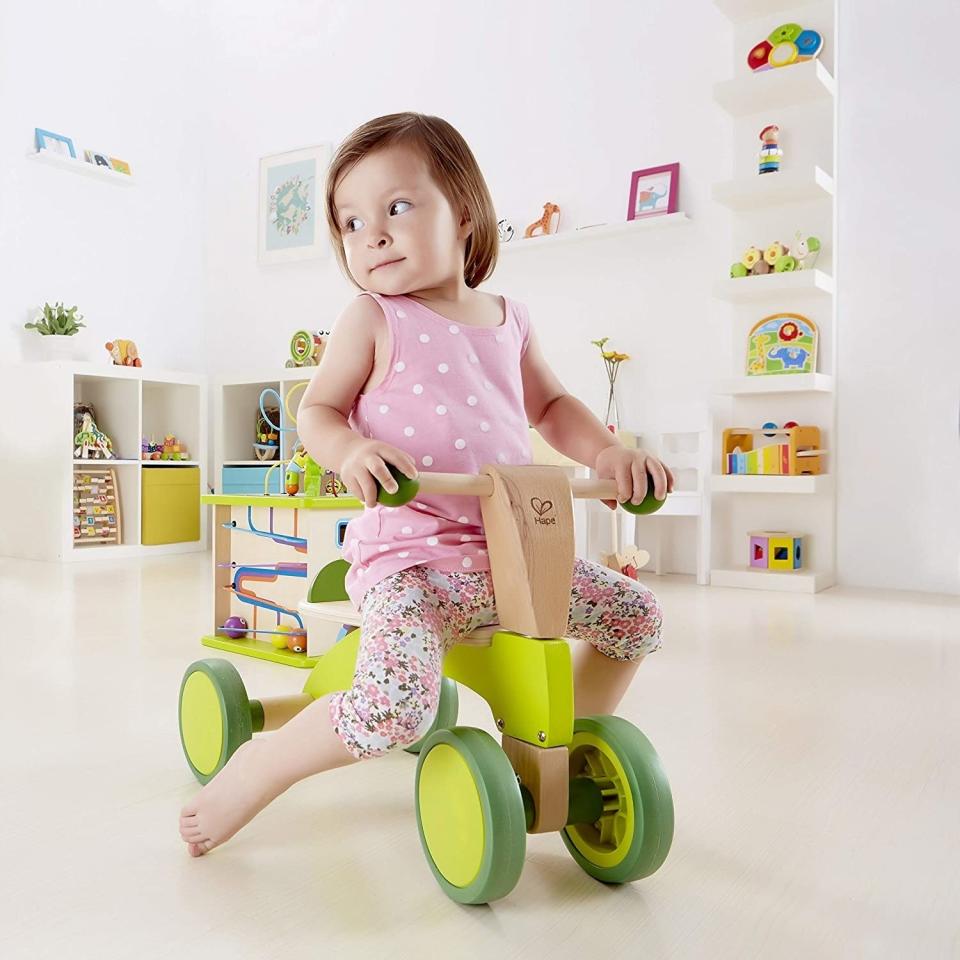 This bike will take it easy on your floors thanks to its rubber wheels, and your toddler can develop motor skills as well as strength and balance.<br /><br /><strong>Promising review:</strong> "This is the perfect scooter for a 1- to 3-year-old. <strong>When my son was learning to stand/walk, he'd use this as a walker by grabbing the handles and pushing it around.</strong> Sometimes he'd push from the back and scoot on his knees. He learned how to get on and off by himself after a year old. Now he can scoot. Pretty soon (When his legs grow a little longer) he'll get the idea and can really go!" &mdash; <a href="https://amzn.to/3sCOOe4" target="_blank" rel="noopener noreferrer">Muffin</a>﻿<br /><strong><br />Get it from Amazon for <a href="https://amzn.to/3sCOOe4" target="_blank" rel="noopener noreferrer">$67.65</a>.</strong>