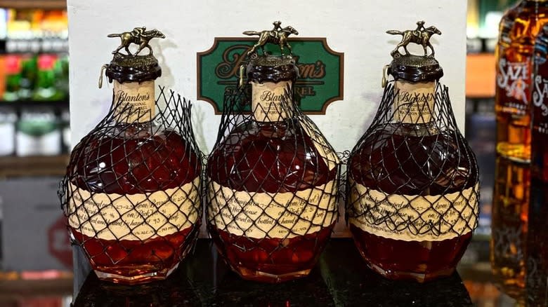 Bottles of Blanton's in nets