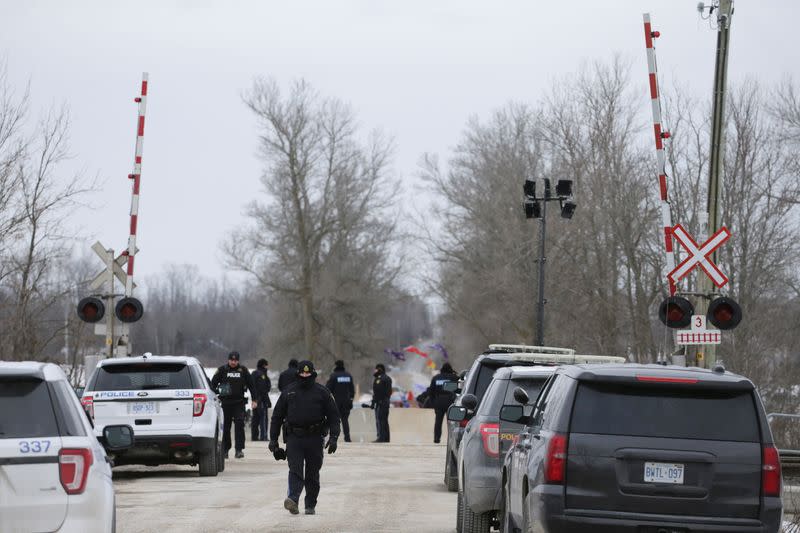 Ontario Provincial Police (OPP) officers guard the site of a dismantled Tyendinaga Mohawk Territory camp, in Tyendinaga