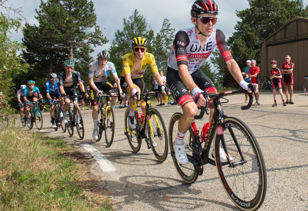 <span class="caption">Last year's Tour de France winner was Tadej Pogacar, in the yellow jersey here – his second consecutive Tour title.</span> <span class="attribution"><a class="link " href="https://www.gettyimages.com/detail/news-photo/tadej-pogacar-followed-by-jonas-vingegaard-during-the-climb-news-photo/1234302769?adppopup=true" rel="nofollow noopener" target="_blank" data-ylk="slk:SOPA Images/LightRocket via Getty Images;elm:context_link;itc:0;sec:content-canvas">SOPA Images/LightRocket via Getty Images</a></span>