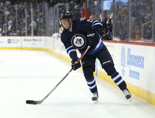 WINNIPEG, MANITOBA - OCTOBER 13: Patrik Laine #29, playing his first NHL game, of the Winnipeg Jets looks to make a pass against the Carolina Hurricanes during NHL action on October 22, 2016 at the MTS Centre in Winnipeg, Manitoba. (Photo by Jason Halstead /Getty Images)
