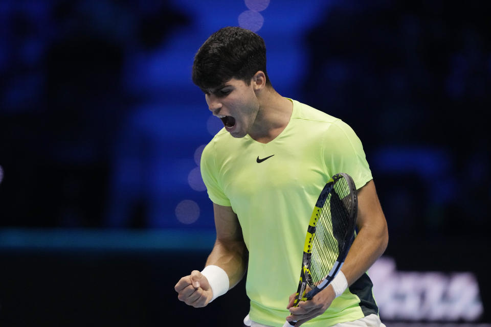 Spain's Carlos Alcaraz reacts during the singles tennis match against Germany's Alexander Zverev, of the ATP World Tour Finals at the Pala Alpitour, in Turin, Italy, Monday, Nov. 13, 2023. (AP Photo/Antonio Calanni)