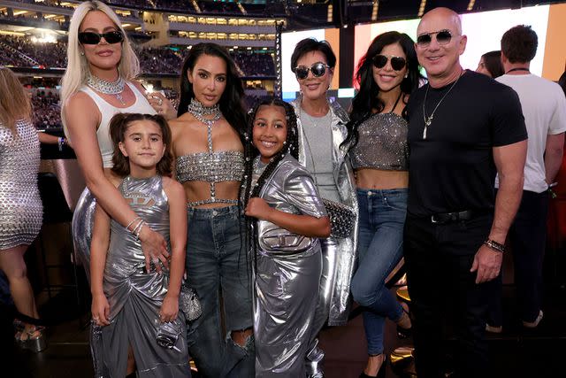 <p>Kevin Mazur/WireImage for Parkwood</p> Khloé Kardashian, Penelope Disick, Kim Kardashian, North West, Kris Jenner, Lauren Sánchez and Jeff Bezos